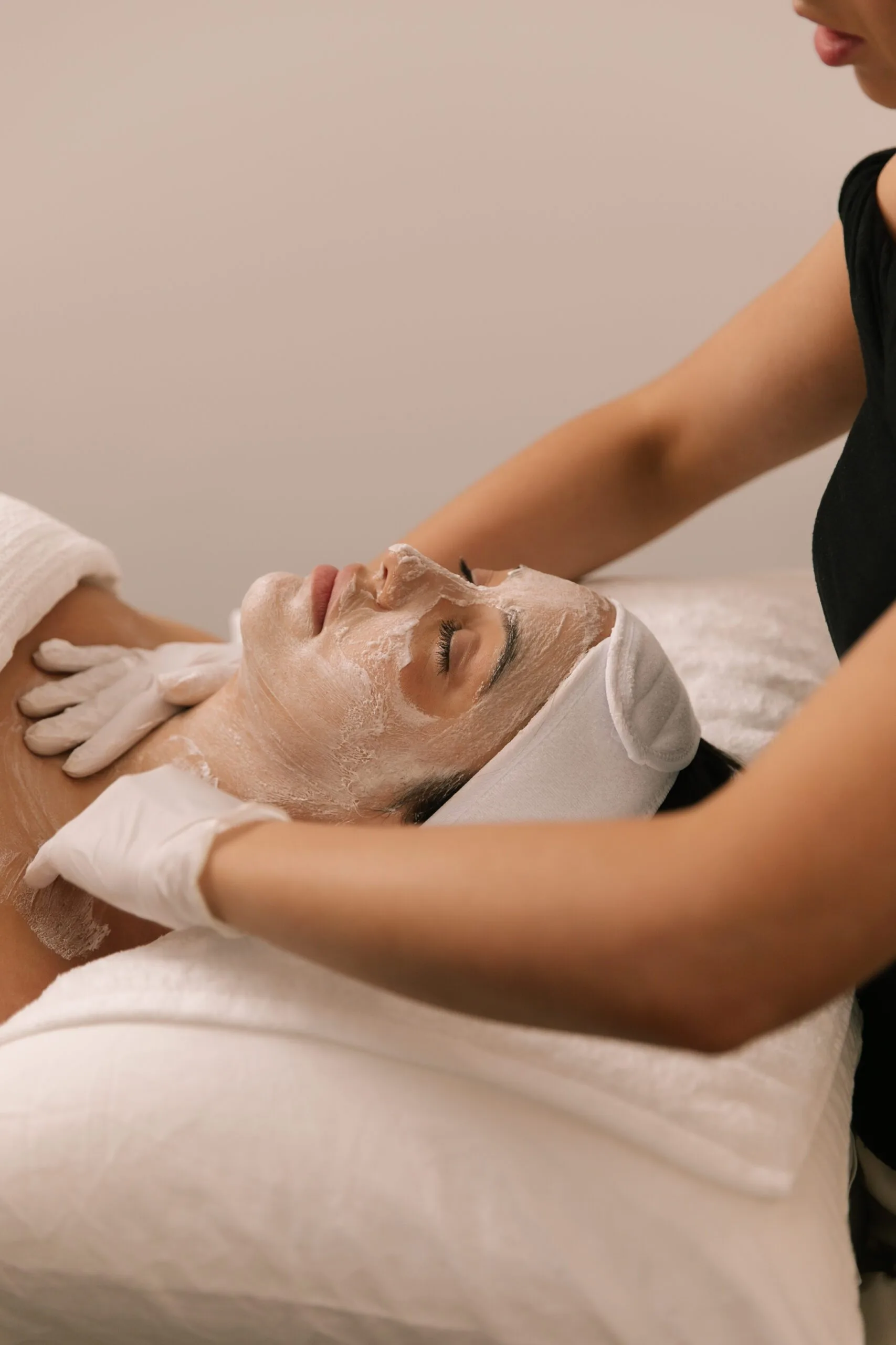 Client receiving an advanced clinical peel treatment at Plump